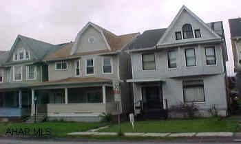 Nice house - Roof did leak so plaster in some bedrooms need fixed.  Owner will look at offers. Owner says get an offer!!  Great starter or investment property.  Furnace is newer - installed in 1998.  100% electric - Vinyl-sided.  Finished attic with heat. Rolled & slate roof.  Nice woodwork.