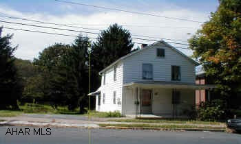 2 story home with great yard for kids. Nice front porch. Off street parking. Private back yard.    Great starter home!