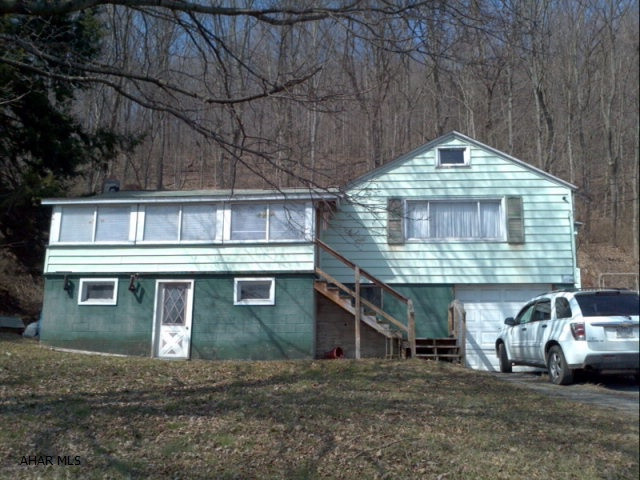 Unlimited potential with this property, Needs TLC to become a very nice home. Could be a great investment or business location. FHA 203K loan could turn this into your dream home