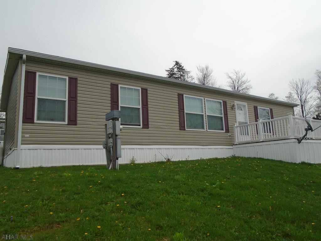 2016 Champion Doublewide in Laurel Woods Mobile Home Park.This can be moved to your own ground!!!! This vinyl sided 3 bedroom 2 bath home has an open floor plan. Living room, dining room, and kitchen. Laundry room with separate entry. Beautiful kitchen with dark cabinets and marble design laminate counter tops. Master bedroom with walk in closest. Master bath with garden tub and large shower. Double sinks. 2 bedrooms with large closets. This home is a must see!!