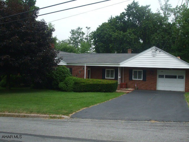 Gas radiant heat in left side - built 1949.  Electric baseboard heat in right side - built 1960.  Large patio to rear of home.  Covered front porch off paved driveway.  100 amp sub box in garage.
