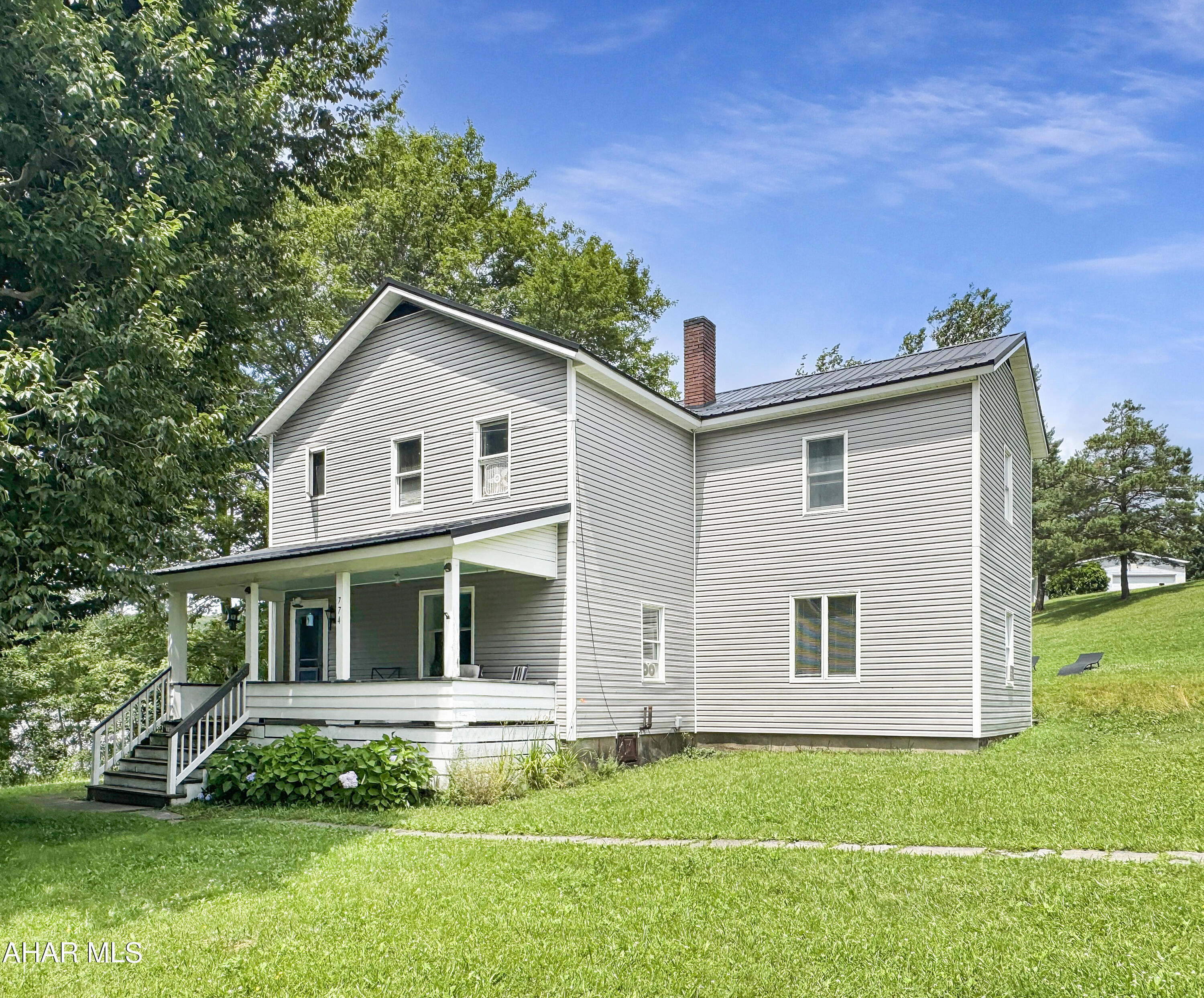 Welcome to 774 Expedite Road, located in the Blacklick Valley School District. This spacious home has been beautifully updated over the years, while still offering plenty of potential for the new owner. Noteworthy recent upgrades include a new metal roof, a brand-new furnace, & various other enhancements. As you enter the main floor, you'll be greeted by a welcoming foyer that leads to a large living room, a dining room, & a fully updated kitchen w/ included appliances. The first-floor master bedroom features a walk-in closet & a full bathroom. Upstairs, you'll find four generously sized bedrooms (one is captive) & an additional full bathroom. The unfinished basement offers ample storage space & houses the laundry. The exterior boasts a half-court basketball court, off-street parking, a covered front porch, a rear deck, & a spacious yard perfect for outdoor activities. Don't miss the opportunity to make this home yours. Call today for more information!