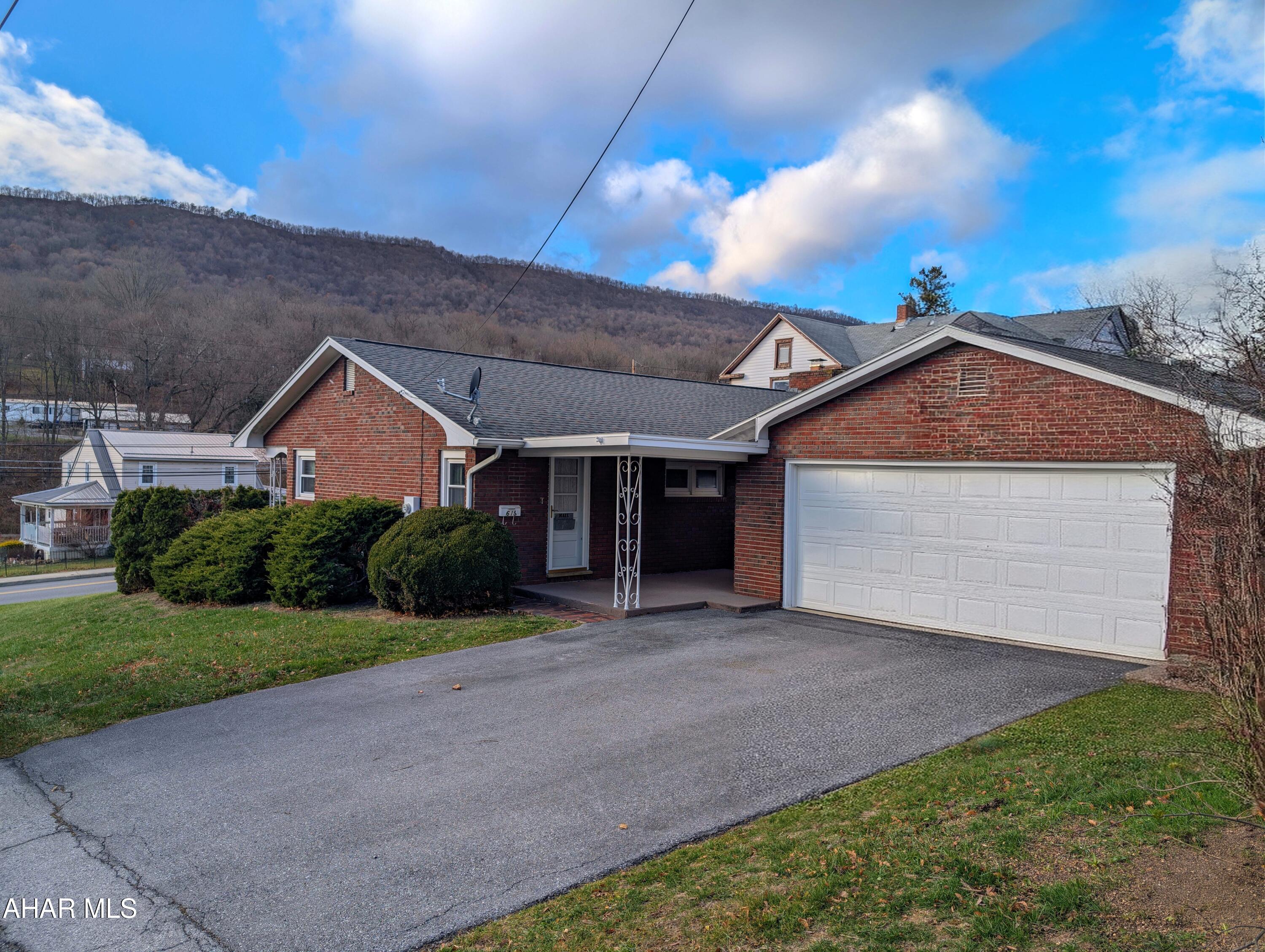 This lovely brick home with a 2 car garage is perfect for someone downsizing or someone just starting out. This home features 2 bedrooms 1 bathroom upstairs as well as a 3/4 bath in the basement. The basement has a wood burning fireplace and is ready for you to finish it as a family room, game room, or whatever your heart desires. It is conveniently located close to all the amenities. Call today to take a peek.