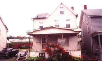 Great starter home offering 3 Br, 4th Br. possible in attic.  1 BA up, 1/4 Bath main floor, 1 car garage & fenced in yard.  Priced right at #30,000.  Request Crystal. Appraisal  on file. DR & LR chandeliers will be replaced with light fixtures.