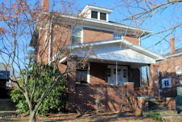 Charming brick home in the heart of Hollidaysburg Borough.  Gorgeous new kitchen w/granite countertops, new stainless steel appliances and ceramic tile floor.  Large living room with fireplace.  Newer rear deck.  New roof in 2008. Nice front porch. Commercial grade air conditioner cools first floor.  2 zone heat.   Lots of character and charm! Agent related to seller.