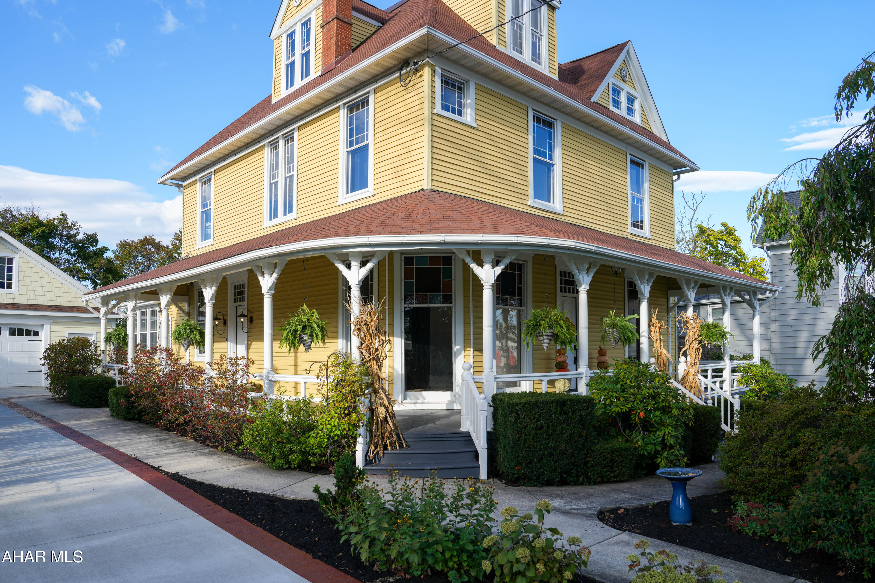 LOCATED AT 807 WALNUT STREET, IN THE HISTORIC DISTRICT OF HBG BOROUGH, THIS COMPLETELY,  METICULOUSLY RENOVATED COLONIAL REVIVAL HOME OF THE VICTORIAN ERA IS A 3600 SQUARE-FOOT, 6 BEDROOM,  3.5 BATHROOMS STUNNING PROPERTY. IT IS  A MUST SEE. MOST NOTABLE ARE THE BREATHTAKING COLOR BLOCK STAINED GLASS WINDOWS THAT ADORN EVERY ROOM IN THE HOUSE . LET THE SUN SHINE IN!  THERE ARE MANY HIDDEN  ARCHITECTURAL  TREASURES WHICH WERE REPURPOSED FROM WITHIN THIS  ORIGINAL HOME, THEY ADD CHARM AND BEAUTY TO ITS DESIGN.  AMENITIES:  NEWLY CONSTRUCTED TWO CAR GARAGE... NEW CONCRETE STAMPED DRIVEWAY... FOUR SEASON ROOM... PROFESSIONAL LANDSCAPING... ECLECTIC LIGHTING THROUGHOUT... BEAUTIFUL ORIGINAL BRICK... MASTER SUITE WITH GENEROUS CLOSET CONFIGURATION AND SERENE BATHING AREA...2ND FLOOR LAUNDRY ACCENTUATED WITH ORIGINAL  FLOOR TO CEILING  CABINETS. .ALL ORIGINAL BRASS HARDWARE REFURBISHED AND RE-INSTALLED THROUGH-OUT ENTIRE HOUSE.  AUTHENTIC EXTERIOR ARCHITECTURE... WRAPAROUND PORCH WITH THREE SEPARATE ENTRANCES INTO THE HOME.... DESIGNER KITCHEN... TWO ZONE HEATING/AC...LUXURY VINYL WATERPROOF FLOORING ON ALL THREE LEVELS... UNIQUELY DESIGNED TILE WORK THROUGH OUT,  THIS HOME IS SPOTLESS AND MOVE-IN READY !!!!!!