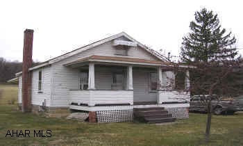ONE STORY FRAME HOUSE.  SMALL COTTAGE LIKE ONE STORY ON TWO LEVEL CLEARED ACRES. MECHANICS ARE GOOD. OWNER TO DRILL NEW WELL.