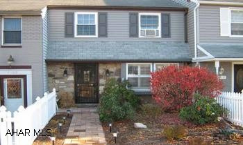 Totally remodeled interior and exterior townhouse in move-in condition.  New kitchen, new carpeting and ceramic tile floors.  Tons of closet space. Two very large bedrooms.  Finished walk-out basement family room with built-in corner cupboards.  Covered rear deck with awesome view of the mountains.  Cement patio  Off street parking and storage shed.  White picket fence and nice landscaping.  Low heating bills... a very comfortable home!