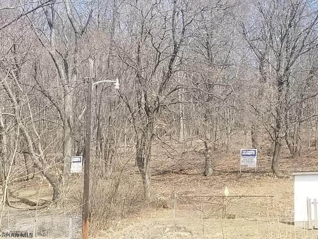 Perfect lot to build your dream home!  This lot is just shy of an acre but the views from the top of the property are astounding! Convenient location with very few homes surrounding the property makes this the perfect combination of country living without being too far.