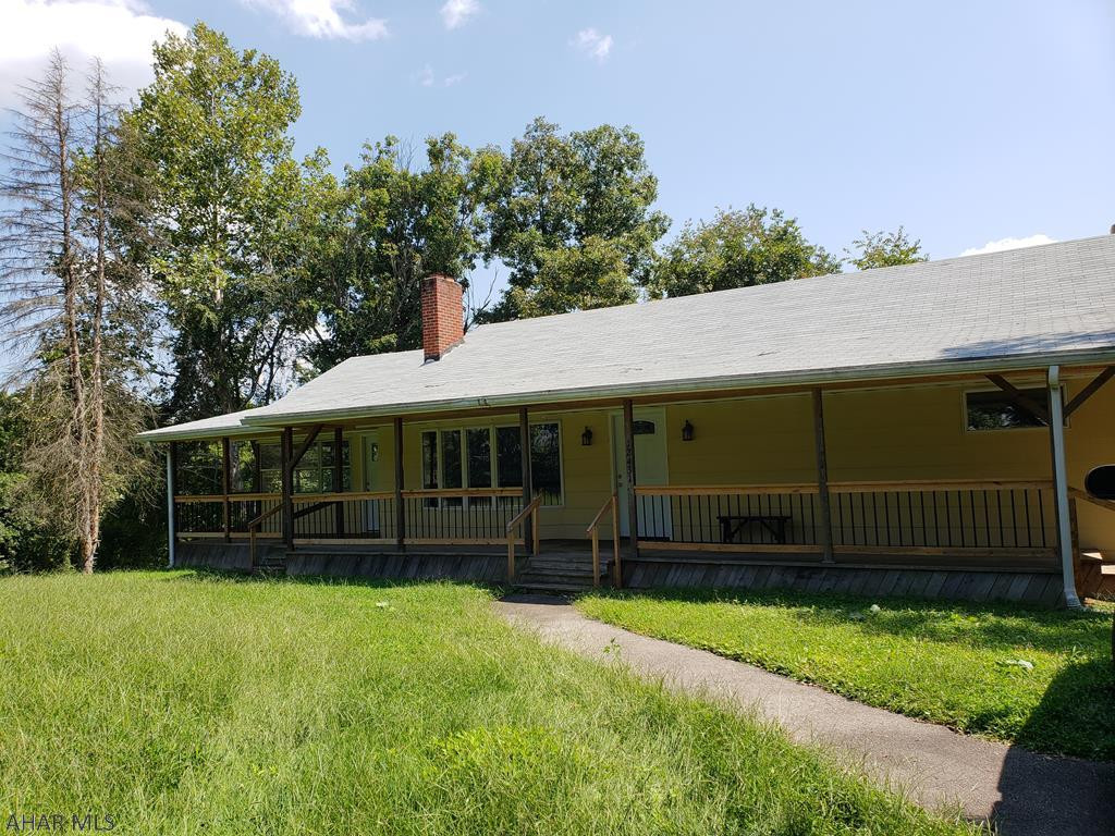 Nice rancher with finished basement. Living room w/ fireplace. Sunroom with wooded views. Paved circular drive. 1-car integral garage.