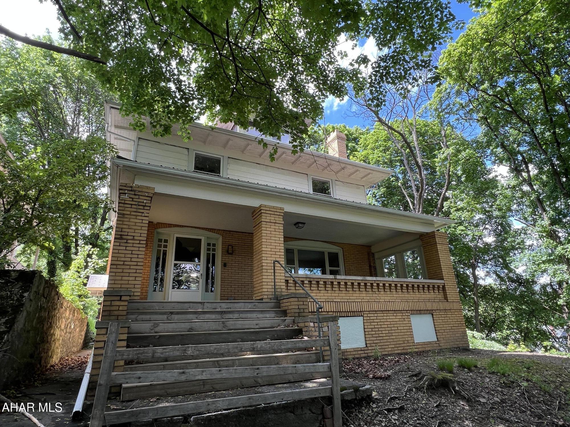 Step into timeless charm with this spacious circa 1900 home, beautifully updated for today's lifestyle. Enjoy the remodeled kitchen and bath w/2nd floor laundry, new flooring throughout, new electric and plumbing, new on-demand furnace/hot water heater, metal roof and new windows. Original details, including some stained and leaded glass windows and rear staircase from the kitchen, add unique charm, warmth and personality only a historic home can offer. You'll love the large front porch and back deck, along with off-street parking. The attic is fully insulated and heated, so future additional living space is a possibility. This home deserves to be seen, so come take a look!