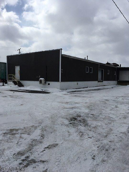 Warehouse in great location. There are 3 dock doors and 1 drive in area with 12ft door.  Could be subdivided by new owner.