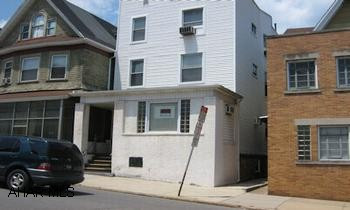 1st fl office, 2 one bedroom apts on 2nd fl, 1 one BR apt on 3rd fl. Needs interior cosmetics. Exteroir, windows, roof, and mechanics in very good condition.