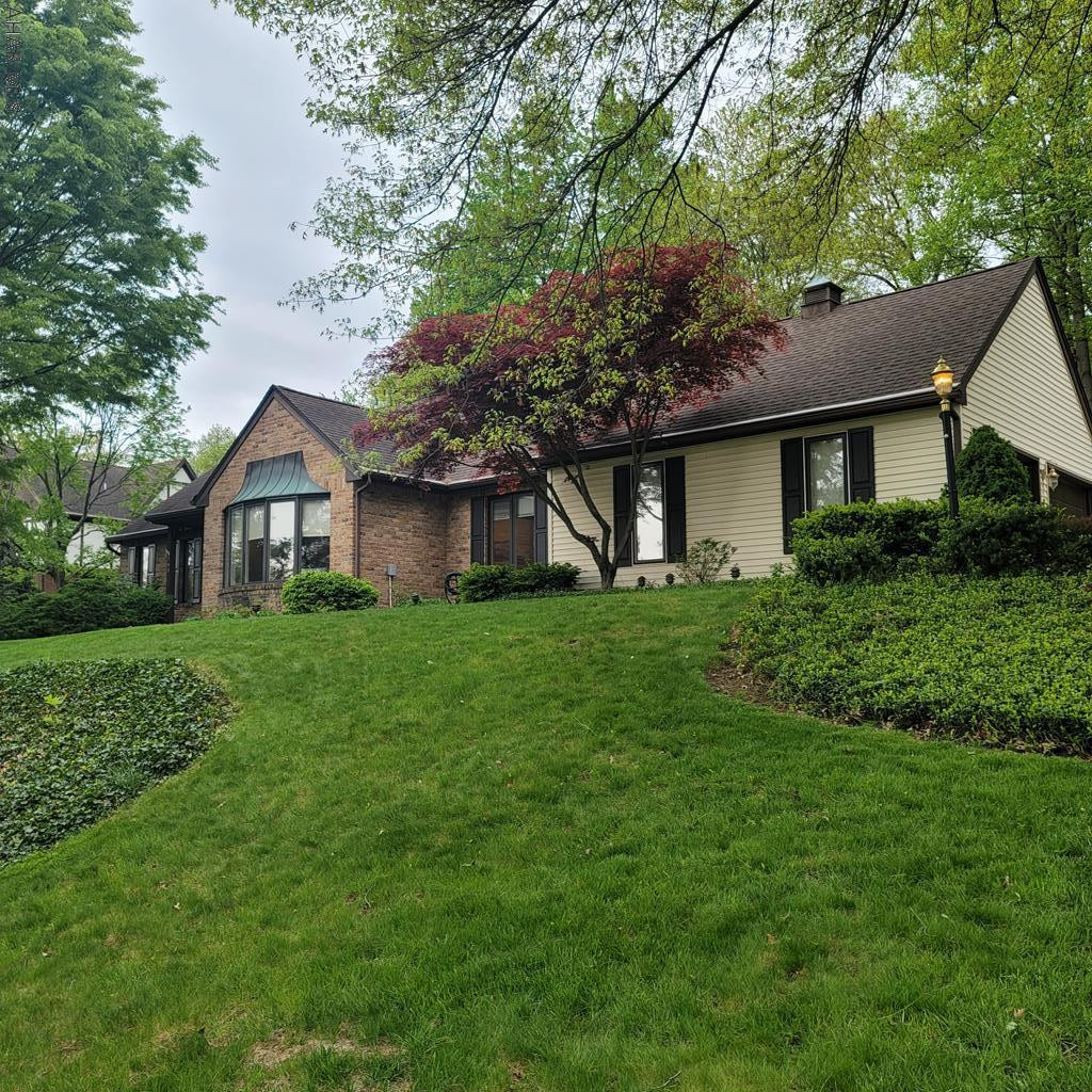 This is a perfect house! The setting is private and secure yet you are minutes from everywhere with gorgeous city views. Landscaped beautifully with a rose garden brick patio and many flowering trees.  When you get inside you will be blown away by the size of the house and the easy flow of all the rooms. It boasts 2 fireplaces for cozy chilly nights. It has a separate dining area for large family gatherings as well as a nice kitchen eat in area for dinners Did I mention the beautiful solid hardwood flooring?. There is a 4 season sun room where you can just sit and enjoy nature year round. New carpet through out the  house, New light fixtures, Nest Thermostat system, New garage doors the list goes on and on! Do not wait on this beauty.