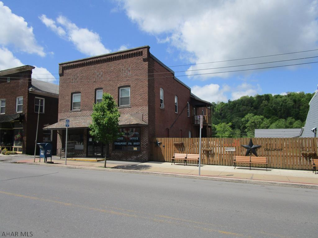 Brick and frame 3 unit apartment including leased post office tennant. Newer roof, and some updates. All units occupied. Nice property.