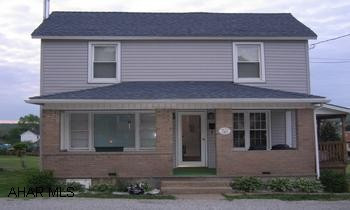 Remodeled 2.5 story on large lot.  This 3 Bedroom, 1 Bath charmer is maintenance free! New roof, siding, floors, carpet, insulation, windows, furnace & hot water heater.  Seller to replace all second floor doors & trim & paint hallway.  Property has private well for leisure.