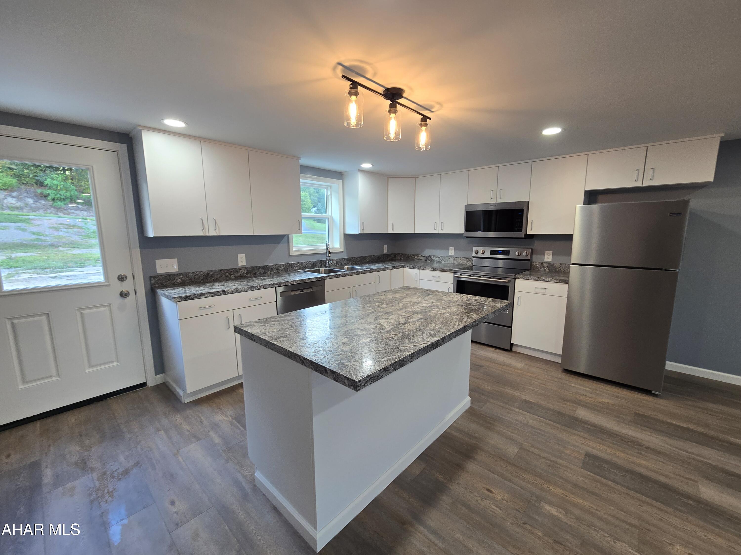 Brand New!!!  Spacious Townhouse available for Rent in the Chestnut Ridge School District.  The 2 bedroom apt. offers an open floor plan on the main floor, with a half bath, laundry area, and large pantry. The kitchen has stainless steel appliances with an island and plenty of cabinetry. The backdoor leads out to a private patio. The  second floor provides a full bath with tub/shower and 2 large bedrooms with walk in closets and new carpeting. Heating heat pump.

Apt. will be available Nov. 17th