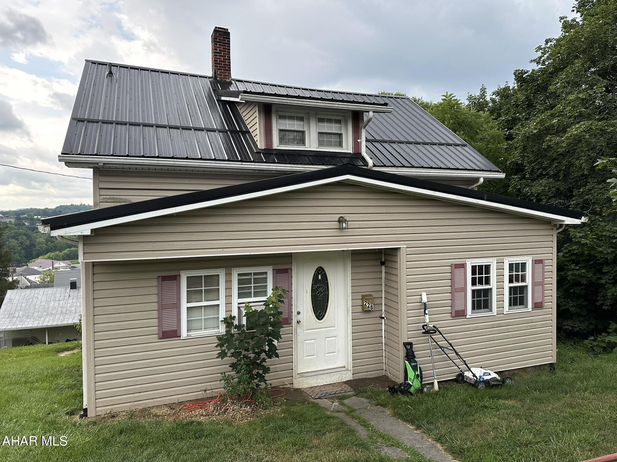 Efficient home in Everett borough is ready for it's new owner. Main floor features an open kitchen with space for an island or eat-in area. Separate dining room. Spacious living room. Bonus room off living area could be office or play room. Rear deck. Upstairs has two bedrooms and one full bath. Newer metal roof. Set up your showing today!
