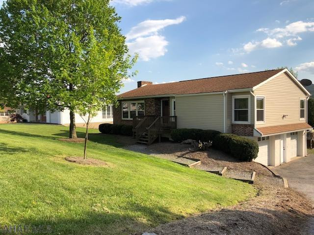 Take a look at this great 3 bedroom, 2 bath raised ranch home in Rolling Hills Development of Hollidaysburg.  Open concept living room and dining room that features vaulted ceilings offering an abundant amount of natural light. New carpet, remodeled bathrooms, and fantastic views from the back deck are only a few amenities.  Finished basement with walkout lower patio to backyard.  Make this place your home, call today for a private showing.