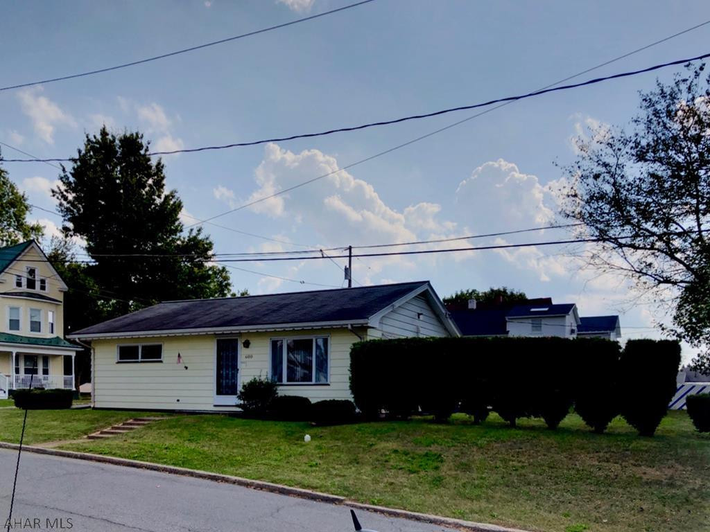 Extremely Well kept Ranch home on a BIG corner lot....If that isn't enough, it has just a couple little extras as well!! Hot water baseboard heat AND central air, Central Vac, Exceptional Hardwood Floors, BIG CLOSETS, updated kitchen with eating area, carport and off street parking, LOW TAXES attic storage, a dry basement that can be finished, oh yeah...and a laundry chute. Bedrooms and Bathroom are large with oversized doorways, linen closet, and a coat closet. What else could you want...oh, a view? Yeah it has one! Make it Home for the Holidays with a private showing today.