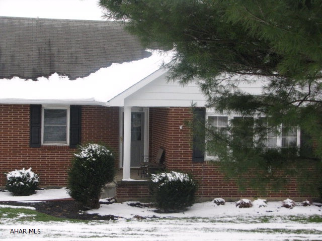 Beautiful brick home. All rooms are large and new flooring has been installed in the first and second floors. Kitchen and baths are all new.  New well pump in 2015 and sandmound in 2013. Large screened porch for you to enjoy those evening out. Walk out basement with an additional patio.  Entertainment space galore. Heated garage.