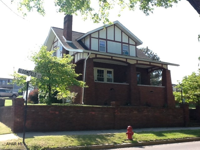Beautiful Classic Brick with old charm and contemporary conveniences. Stained glass, beveled glass, pocket doors, quaint wood benches, old custom built-ins, 2/fireplaces gives this home charm. 4 bedrooms, walk-in closets, eat-in kitchen, patio, deck, fencing, garage, hot tub and 18 x 36 inground pool for todays contemporary family. Great location on corner lot.