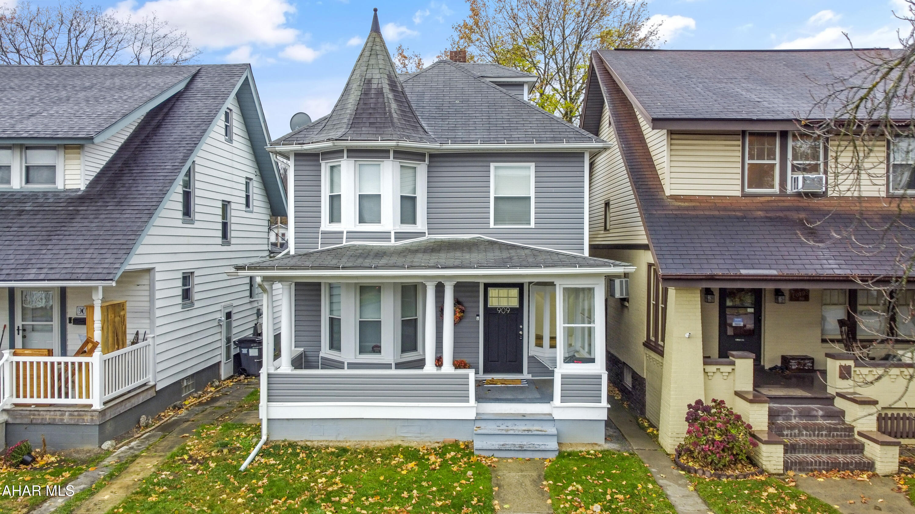 Discover this stunning home in Altoona's Juniata section, recently transformed through a complete remodel that showcases an array of breathtaking features. The extensive updates include central air, a new furnace, windows, siding, & exquisite finishes throughout. As you step into the main floor, you'll be welcomed by a generous foyer leading to a cozy living area complete w/ an electric fireplace. The dining room flows seamlessly into a spacious kitchen adorned with granite countertops, a large pantry, & convenient first-floor laundry paired w/ a half bath. Upstairs, the master bedroom offers a luxurious en-suite full bath & an expansive walk-in closet. You'll also find a third full bathroom & two additional well-appointed bedrooms on this level. Both the attic & basement remain unfinished, providing ample space for storage. The exterior of the home boasts charming covered porches at both the front & rear, a fully fenced yard for added privacy, & a detached two-car garage. Don't miss this opportunity—call today to schedule your viewing!