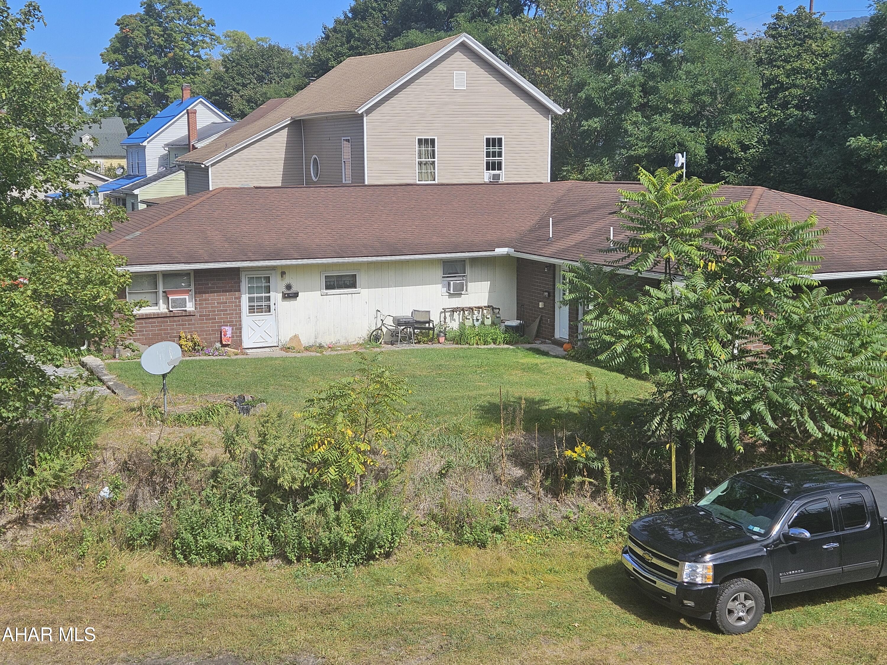 All brick, one story 4 unit in the Borough of Bellwood.  This property offers 3 two bedroom and 1 one bedroom apartment.  Off street parking for tenants.  Fully occupied with three long term tenants.