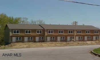 Hampton Court Townhomes New Constuction- Oak Kitchen- Trex deck- Home Owners Association- Convenient LocationHomeowners Association Fee- $60.00 Includes- Security Lighting, Grass Cutting, Snow Removal, Garbage Removal