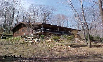 Gorgeous view, peaceful setting. Rt 36 S, R before bridge to Loysburg, 1/2 mile R curve, go 2.6 mile R on Texas corner road, 1.4 mile L up lane, log home at top of hill.  #J-591 Gorgeous view, peaceful setting. Rt 36 S, R before bridge to Loysburg, 1/2 mile R curve, go 2.6 mile R on Texas corner road, 1.4 mile L up lane, log home at top of hill.  #J-591