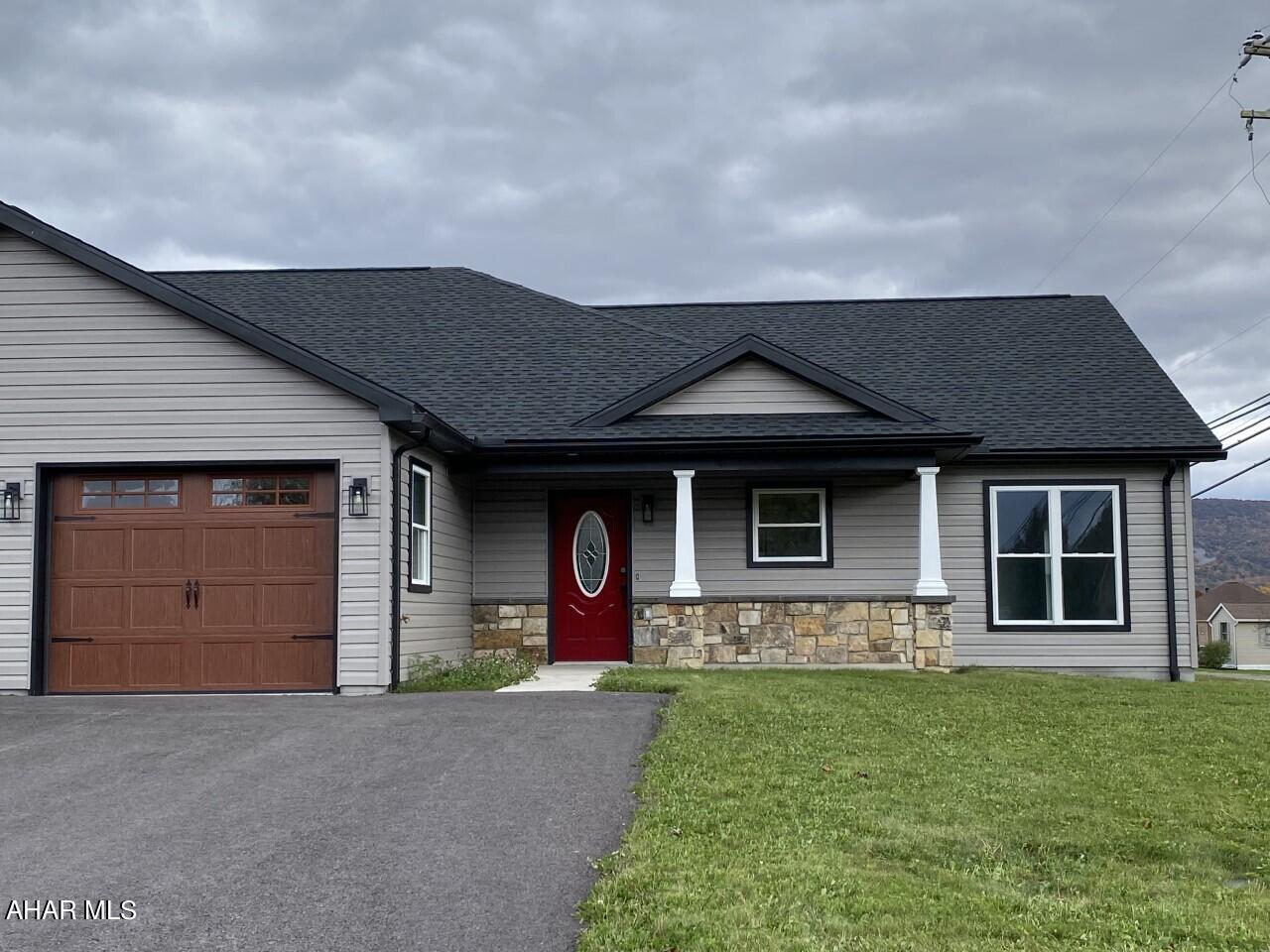 Beautiful New Construction with two bedrooms and full bath, open floor plan with vaulted ceilings, granite countertops in kitchen and new appliances, attached garage with epoxy floors, central air