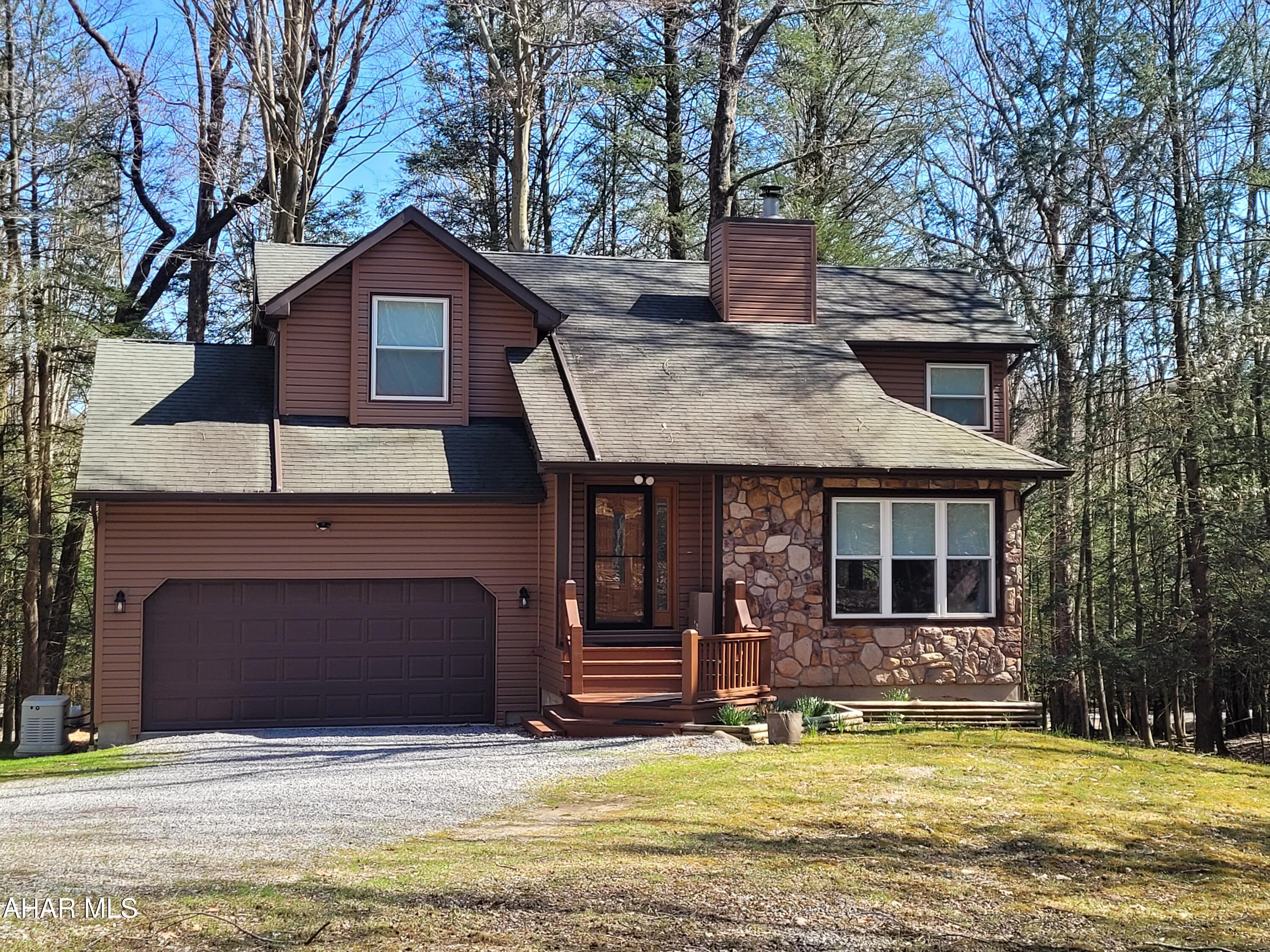 Meticulously maintained three bedroom home on over one acre.  Sellers are downsizing after making many upgrades.  Cozy up in front of the gas fireplace in the winter and enjoy the expansive back deck when the weather warms up.   The full finished basement offers you additional, private living space.  The two car garage and the shed add storage space.  
The sellers replaced all of the windows and most outer doors, had new siding and gutters installed.  The water heater, and kitchen appliances are new along with carpeting in several areas.  You have no worries if the power goes out as they added a new Generac generator.  Many other upgrades will offer you peace of mind when you move into this charming home located in Glendale Yearound on a quiet lane.
The private development adjacent to Prince Gallitzin State Park / Glendale Lake has a clubhouse, seasonal swimming pool, tennis / basketball / volleyball courts, dog park, planned activities and more.

Seller may need time to find suitable housing.