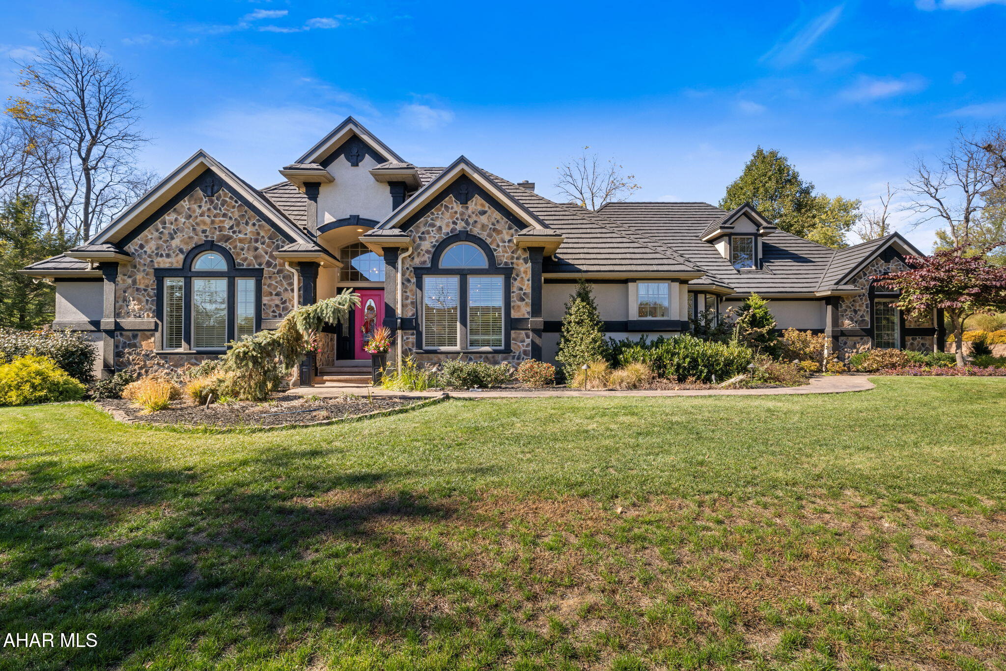 A breathtaking estate on 4.41 acres that has something for everyone! This stunning magazine-worthy home has been completely renovated and designed for the pinnacle of luxury and entertaining. With no detail overlooked, the property offers an unparalleled resort-style experience for both owners and guests. Every room has been meticulously renovated with high-end finishes, creating an elegant and modern living space that feels both grand and inviting. Showcasing the highest standard of craftsmanship, this magnificent home is appointed throughout with custom-built Amish cabinetry in several rooms offering beautiful and functional storage solutions with a timeless elegance. The main living space has been thoughtfully designed to create a social and inclusive atmosphere. The open layout ensures that guests and hosts are always connected, allowing conversation and laughter to flow effortlessly between the kitchen, dining, and living areas. With clear sight lines throughout, no one will have their back to the action, making every gathering more engaging and memorable. The home also features a well designed finished basement, offering multiple entertaining areas, perfect for cozy gatherings or a lively game night. A versatile second-floor space, currently used as a craft room, offers endless possibilities. It could easily be transformed into a productive home office, a cozy extra bedroom for guests, or an inspiring creative studio to suit your lifestyle needs. A massive in-law suite is located above the garage. The separate entrance allows privacy and comfort with a full kitchen and living area perfect for extended family, guests, or a live-in nanny. Car enthusiasts and hobbyists will revel in the impressive heated and air conditioned 12-car barn/garage, offering secure storage for a prized collection. The backyard is a private resort featuring a pristine saltwater pool with a covered pavilion. This space includes a full kitchen and pool house ensuring that everything you need for poolside entertaining is right at your fingertips.  In addition to the pool pavilion, a separate outdoor pavilion makes it easy to host large parties, barbecues, and al fresco dining events. The property also includes a one-car garage with an attached shed, perfect for gardening enthusiasts or those seeking a dedicated space for their tools and plants.  This one-of-a-kind property combines sophisticated luxury with exceptional functionality, creating a haven for both intimate family living and large-scale celebrations. Your personal resort awaits. Buyer to verify all measurements.  Square footage is from courthouse records where there is over 1000 square feet in in law suite above detached garage.