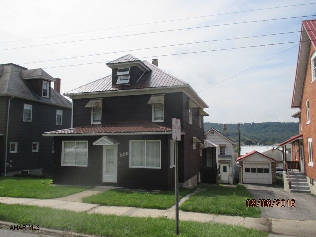 909 School Ave property located behind this home can be purchased together with this home. Currently rented. 2 bed, 1.5 bath with attached garage.Both properties have metal roofs 1 yr old.  Furnace on Chestnut property is less than a year old.Both properties have updated sewage in compliance with West Branch Sewage Authority.