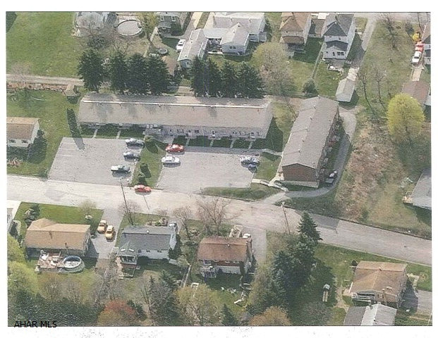 9 units in a two level apt building with six townhouse units with 2 lower level apts. Owner built and managed. Very good condition. Good occupancy record.