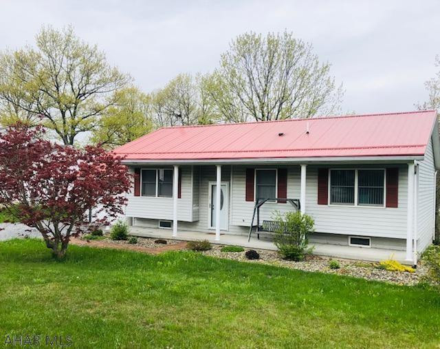 3 Bedroom ranch home. All new floors, fresh paint. This home features covered porch, rear deck. Basement has washer and dryer, nice wood burner in the living room.