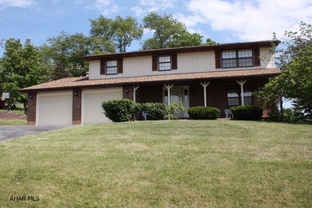 This home is move in ready, nothing to do except add your own personal touch.  Make this well maintained home with 4 Bedrooms, 2 Full Bathrooms, Large two car garage that is insulated and heated, and a large Family Room with a Fireplace and Doors to the backyard your home. Lots of parking too. Do not hesitate because this one will be gone, call the listing agent for a personal tour.