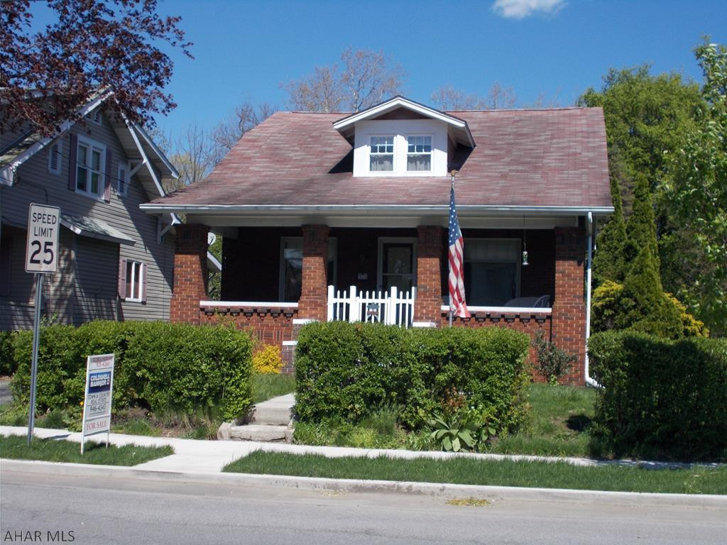 Neat, clean and totally move in ready,  Super nice brick Craftsman on an oversized lot in the HASD.  Check out the large detached garage, cozy front porch, nice open floor plan, natural woodwork, energy efficient windows and central air..