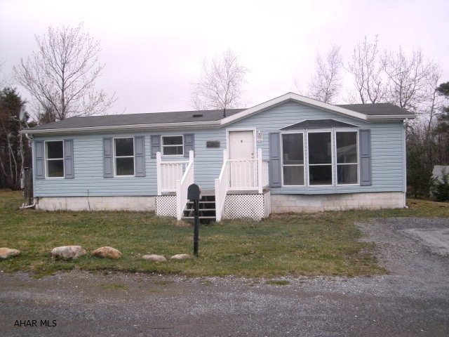Very nice doublewide on extra large lot. Perfect location would be a great starter home. Seller will provide an allowance to repair back door.
