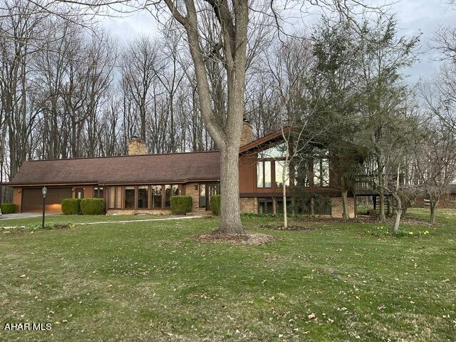 If you are looking for total privacy yet close to town this is the home for you!! 4 bedroom 4 bath multi level home on beautiful 10 acres with views from all sides of the home. Large windows from the living room and family room offer wonderful sunsets. Master bedroom suite with a private deck. Lower level offers 2 bedrooms with bath and second floor offers guest bedroom with additional bath. There is also a barn on the property with fenced in area for the animals. This home is a must see call today for a private showing