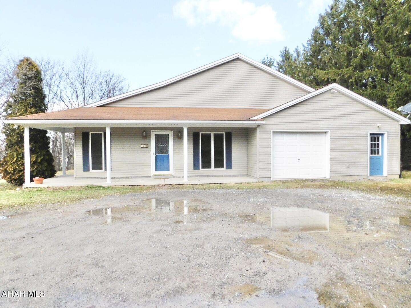 This is a very spacious 3 BR 2BA sprawling rancher with Owner's suite that offers walk in shower. Situated in Logan Township - offers space and privacy. Large oversized garage w/pull down attic for additional storage. All freshly painted, cleaned and ready for you! Will need new flooring - it has all been removed so buyer can pick their preference. Home Warranty included.