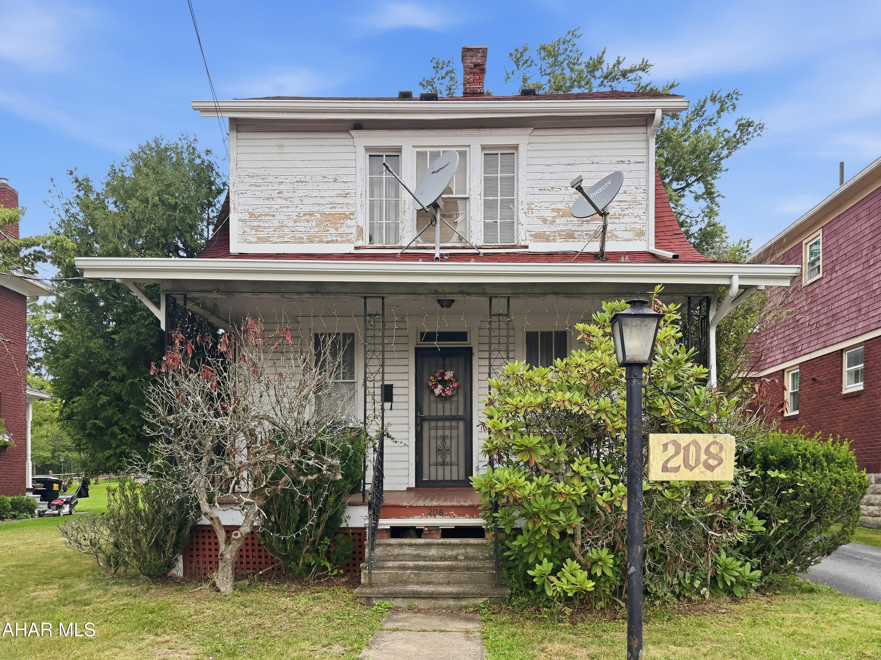 Welcome to 208 Blair Street in the Westmont Borough! This Cape Cod-style home is full of character and offers an excellent opportunity for a buyer looking to add their own personal touches. The main level features a spacious living room highlighted by an ornate fireplace, a formal dining room with charming built-in cabinetry, and an eat-in kitchen with sliding glass doors leading to the rear deck. Upstairs, you'll find two generously sized bedrooms and a full bathroom. The heated, finished attic provides additional flexible space with excellent potential for a future bedroom, office, or bonus room. The finished basement includes a family room, laundry area, and a second full bathroom; however, buyers should note the basement has active water intrusion and mold issues. Outside, enjoy a covered front porch, fenced backyard, rear deck, detached one-car garage, and off-street parking. This property is being sold AS-IS, and the buyer will be responsible for any required municipal inspections, sewer testing, certifications, and any associated repairs or costs. Don't miss this opportunity to build equity in a home that has tons of potential!