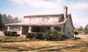 Beautiful solid stone!  Park like 1.8 ac yard, stone fireplace in LR, 1st floor BR/BA plus 4BR/BA on 2nd floor, HW floors.  "Character!"  Penn Cambria School District.  Call Linda Lewis at 886-7175 to preview. Beautiful solid stone!  Park like 1.8 ac yard, stone fireplace in LR, 1st floor BR/BA plus 4BR/BA on 2nd floor, HW floors.  "Character!"  Penn Cambria School District.  Call Linda Lewis at 886-7175 to preview.
