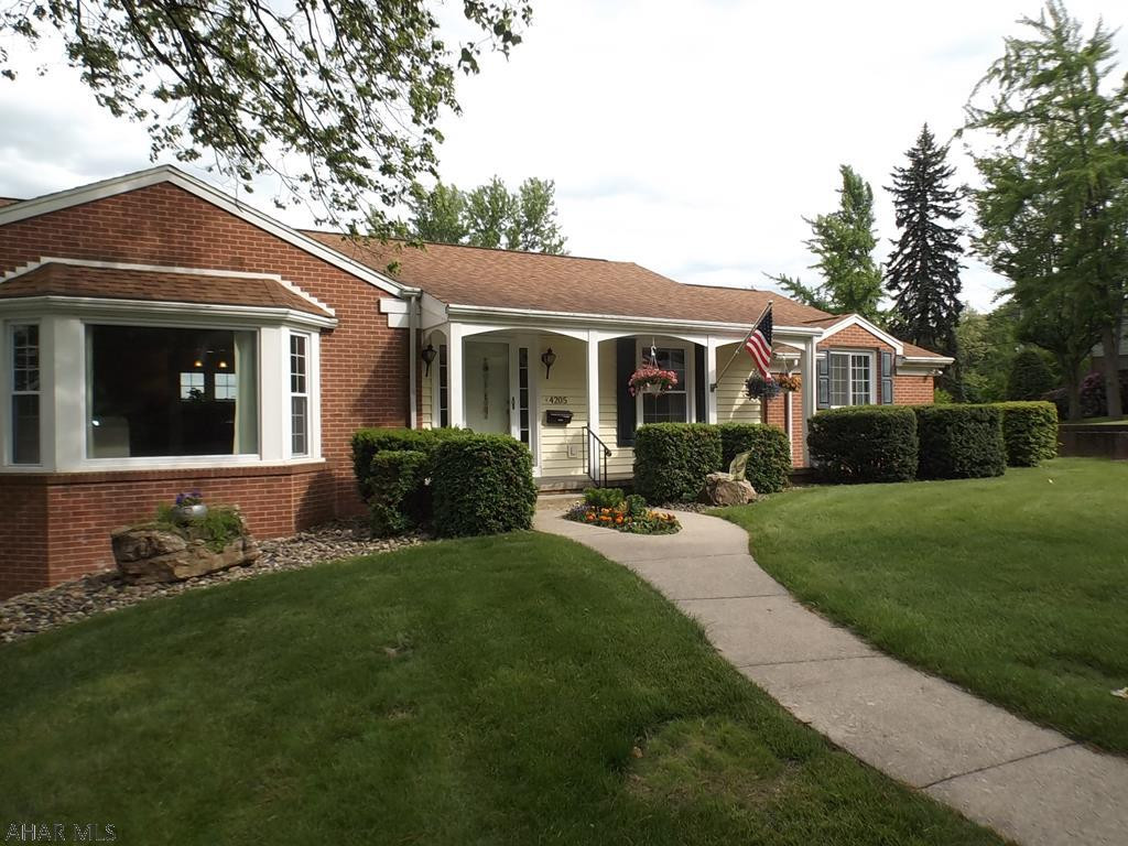 Beautiful rancher located in the sought after neighborhood of Highland Park. Features open floor plan w/h/w floors leading from the foyer into the living rm, kitchen, dining rm and hall. Living rm has a wood burning fireplace.. Kitchen updated w/granite tops, custom cabinetry, ss appliances. Convenient laundry rm off the kitchen. Formal  dining rm w/easy access to a deck w/custom awning. Terrific View. M. suite offers spacious bedrm, m bath w/double bowl granite vanity, heated tile floor, soaking tub and large walk-in shower. Main bath has been completely updated. Walk-out lower level  offers a family rm, kitchenette, bonus rm or bedrm, full bath and cedar closets.Spacious 2 car garage w/heated driveway.  This  home has been completely renovated top to bottom. This jewel won't last!!