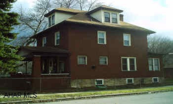 Sellers must find suitable housing.  Solid brick home with hardwood floors. Large fenced corner lot. 2 car garage, fireplace, breakfast nook, sunroom, formal dining room, attic is partially finished - could be used as 4th bedroom. All appliances included. Seller giving a $2000 allowance to buyer.