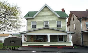 Many new improvements-main roof new in 1998. New water line, new boiler, new replacement windows and some new carpet. 1/2 bath/laundry room on 1st floor.