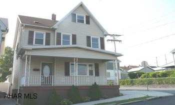 2-1/2 STORY WITH VINYL SIDING, 2 CAR GARAGE AND MANY UPGRADES WITHIN.  KITCHEN APPLIANCES INCLUDED. MOVE-IN CONDITION.  LARGE KITCHEN WITH NEW APPLIANCES.  HARDWOOD FLOORS IN DINING ROOM AND LIVING ROOM.   3 BEDROOMS, FULL BATH, NEW CARPETS, NEW FURNACE, LARGE 2 CAR GARAGE.