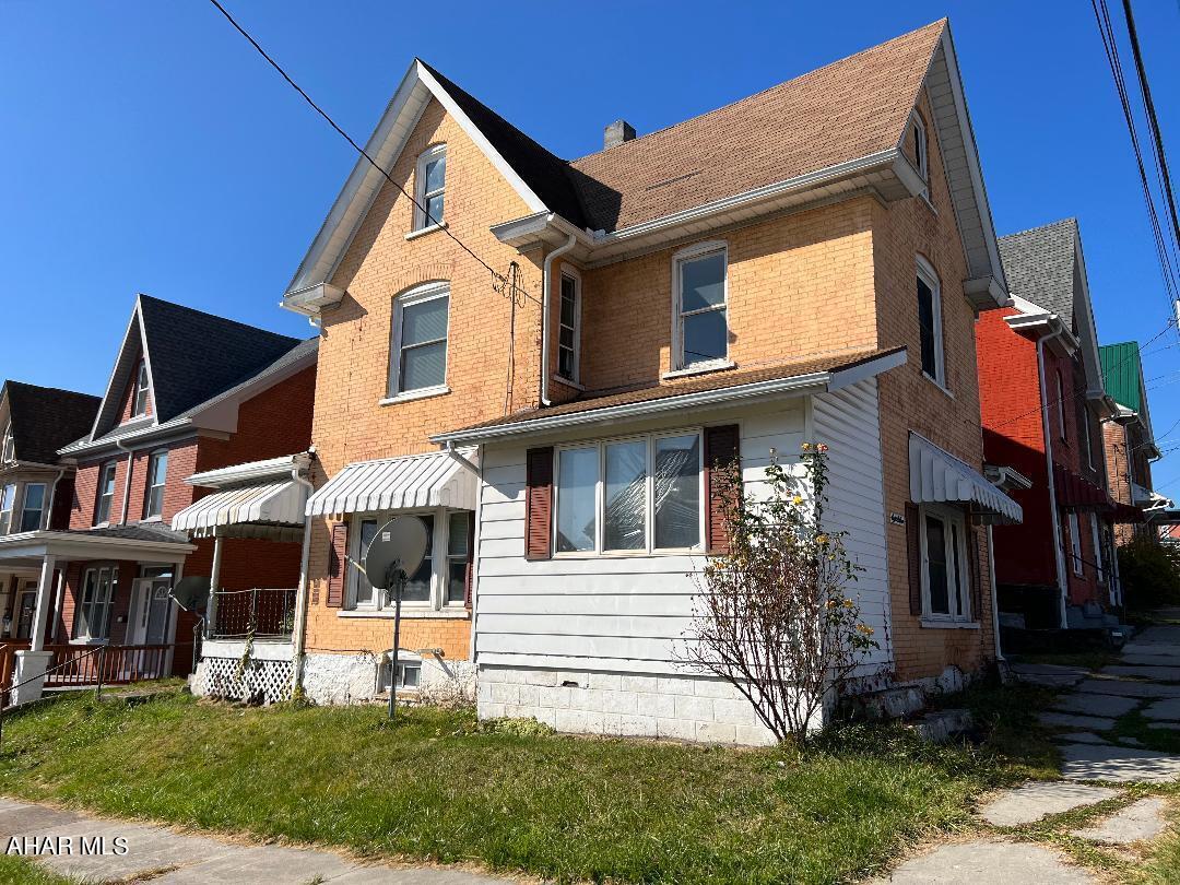 Corner lot in Juniata. 4 bedrooms, 1 full bath, large living room and dining room, sun porch, covered porch. Property was a rental. Roof is scheduled to be repaired.