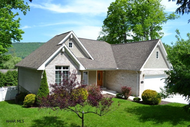 Wonderful location for this 4 bedroom, 2.5 bath home in Bedford Borough. Open kitchen and living areas with oak cabinets, dark granite counters, stainless appliances, walk-in pantry, hardwood floors, and custom gas fireplace with builit-ins and in ceiling surround sound system. Full master suite with walk-in closet, tray ceilings and garden tub. Full finished,walkout, basement. Rec room, bedroom,and bath. The fenced back yard has multi-leveled deck, play equipment, and hot tub. Full 2 car attached garage, concrete driveway, central VAC, Central AC, and much more.