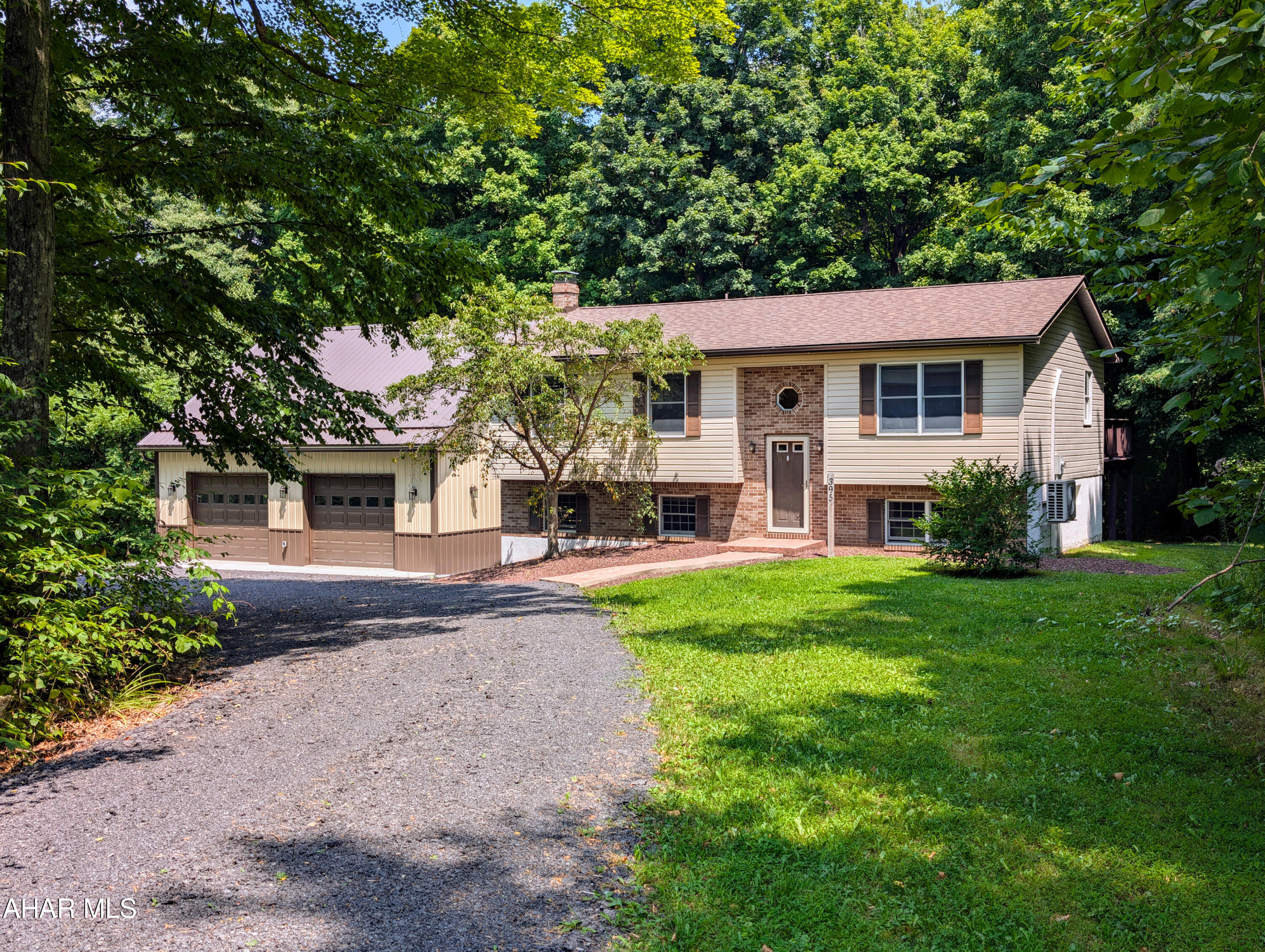 Don't miss out on this home located in a very lovely neighborhood. Home has 3 bedrooms and 2 baths, with a possible 4th bedroom in the lower level. Kitchen/Dining opens to the rear upper deck. Surrounded by trees for privacy , yet plenty of yard for playtime and gardening.  Heat is electric but also has a wood pellet stove in the lower level, mini split in upstairs living room keeps the upstairs cool. Sellers just built a 32X32 insulated garage with heat/electric and water, has storage space above. House roof was replaced in 2022, private well and sand mound.  Take a look at this move in ready home.